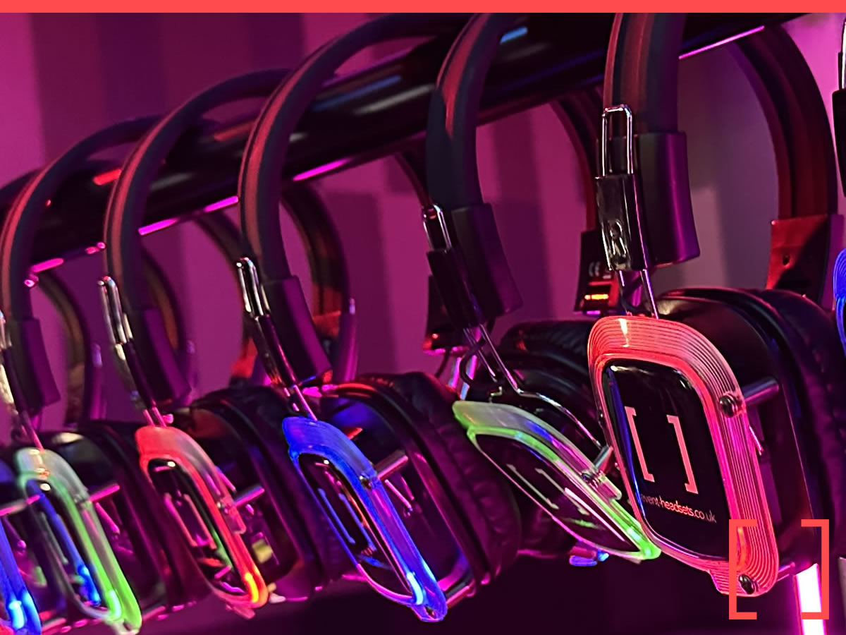Guests dancing with light-up silent disco headsets